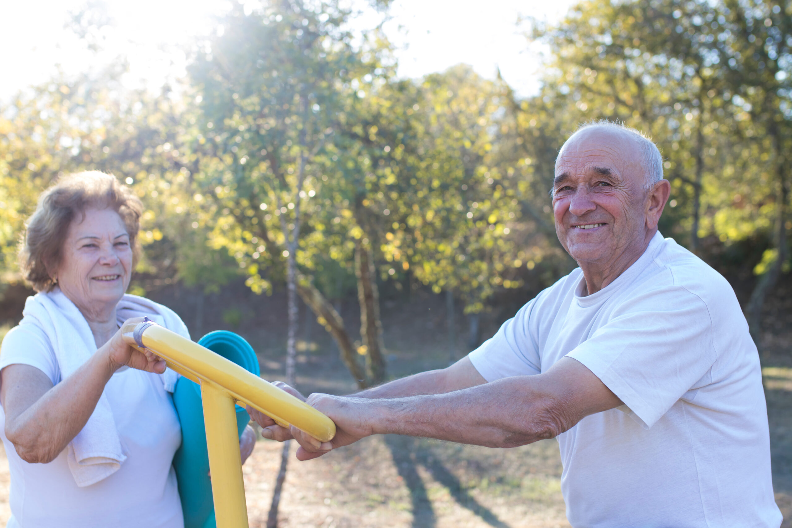 happy older people doing outdoor sports, couples